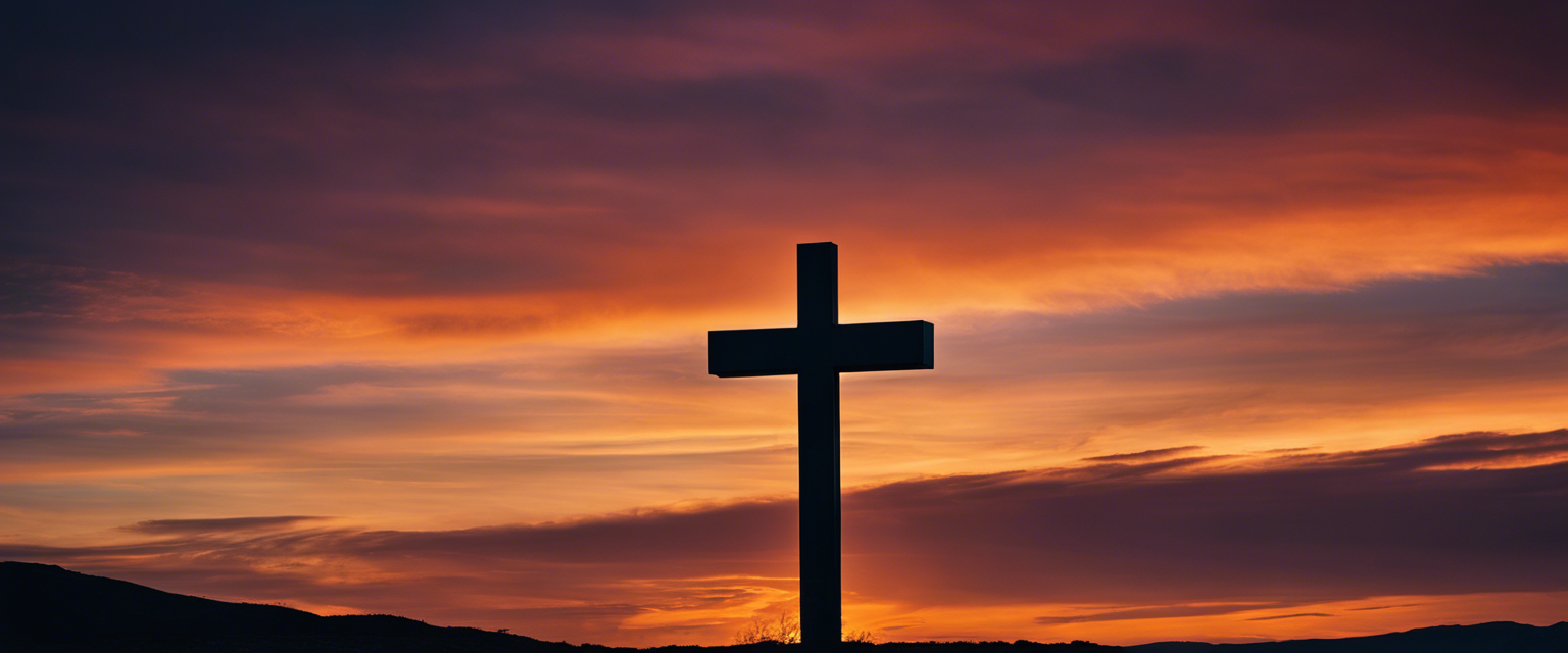 Cross against a twilight sky