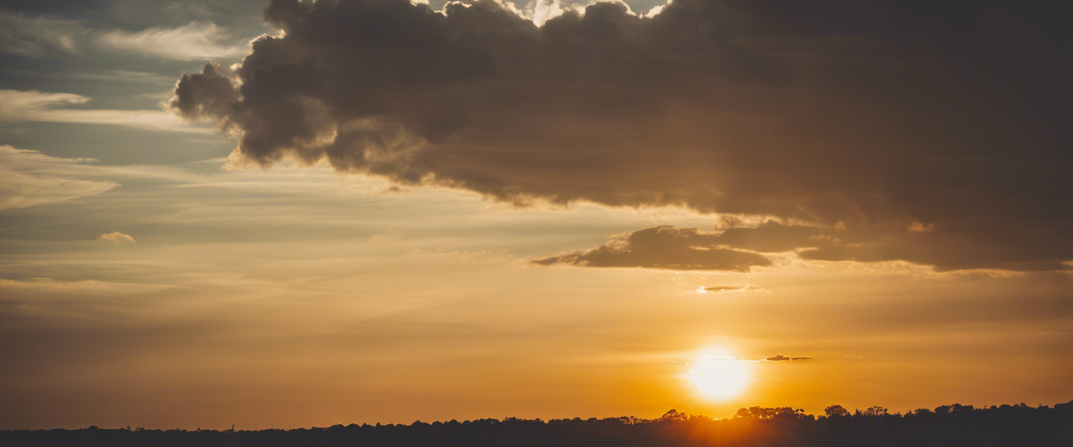 A radiant sun emerging from behind a cloud, symbolizing the healing power of faith